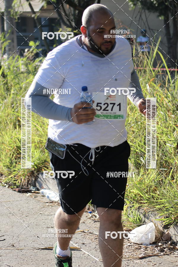 Buy your photos of the eventMeia Maratona de Divinpolis on Fotop