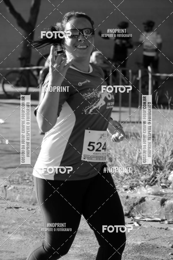 Buy your photos of the eventMeia Maratona de Divinpolis on Fotop