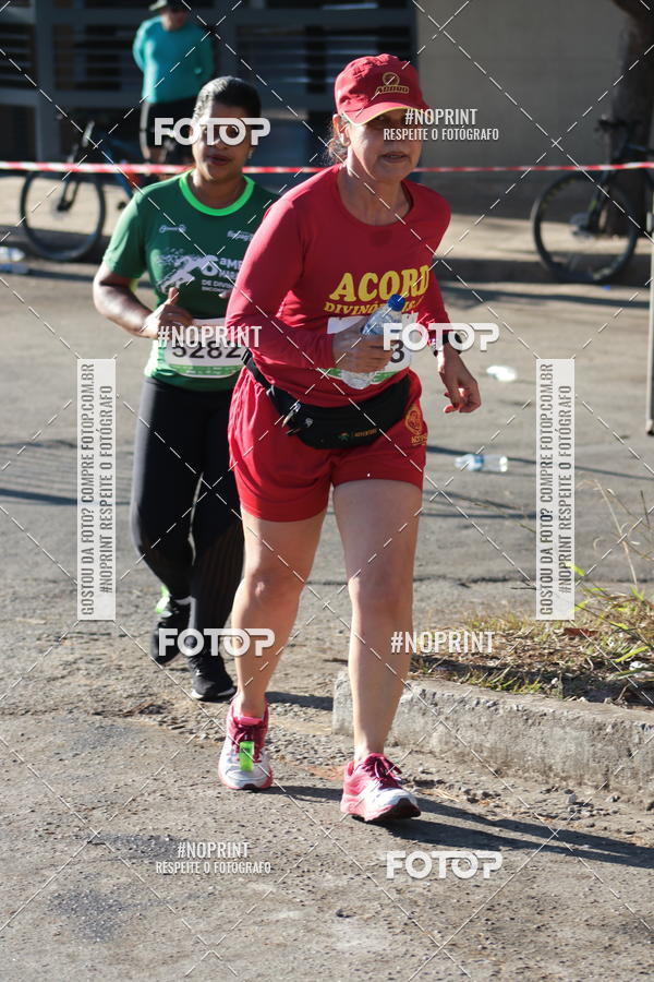 Buy your photos of the eventMeia Maratona de Divinpolis on Fotop