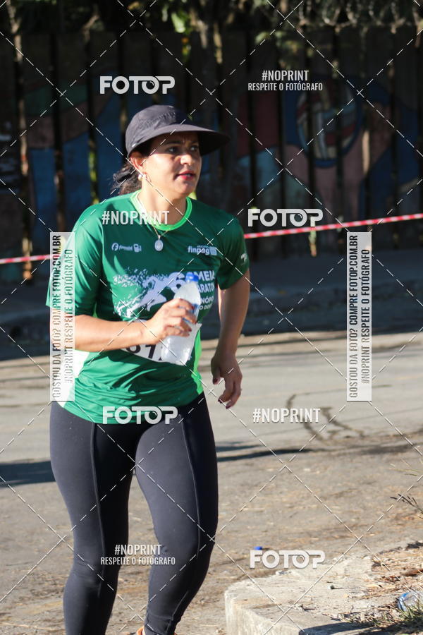 Buy your photos of the eventMeia Maratona de Divinpolis on Fotop