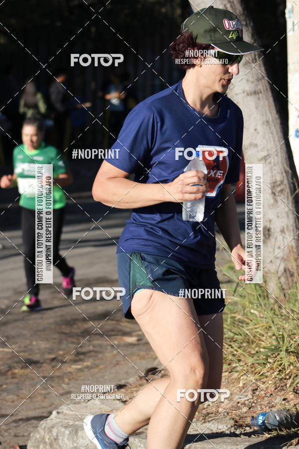 Buy your photos of the eventMeia Maratona de Divinpolis on Fotop