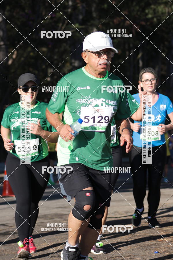 Buy your photos of the eventMeia Maratona de Divinpolis on Fotop