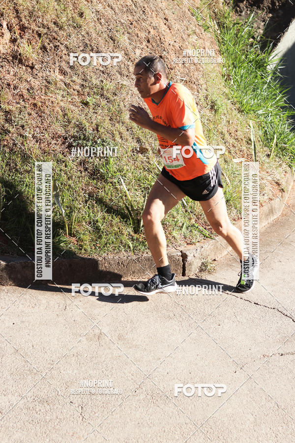 Buy your photos of the eventMeia Maratona de Divin�polis on Fotop