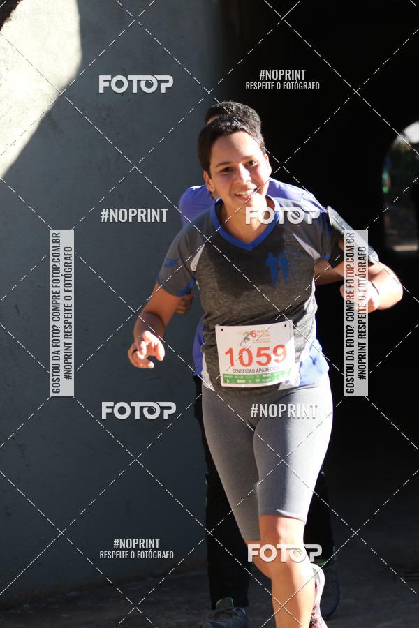 Buy your photos of the eventMeia Maratona de Divin�polis on Fotop