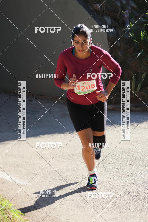 Buy your photos of the eventMeia Maratona de Divin�polis on Fotop