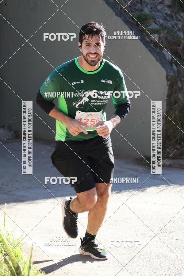 Buy your photos of the eventMeia Maratona de Divin�polis on Fotop