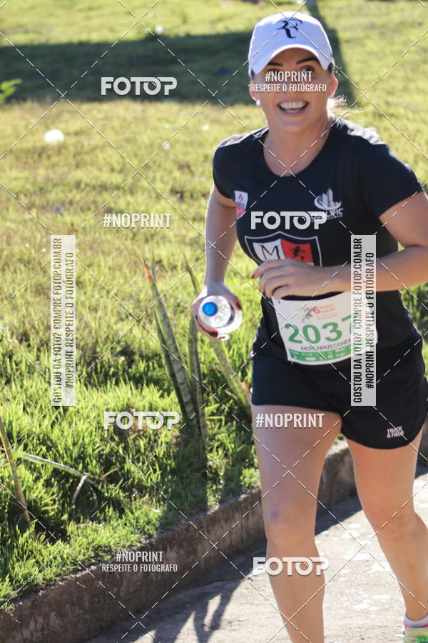 Buy your photos of the eventMeia Maratona de Divin�polis on Fotop