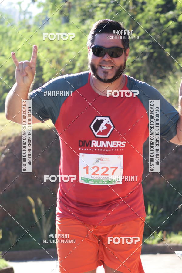 Buy your photos of the eventMeia Maratona de Divin�polis on Fotop