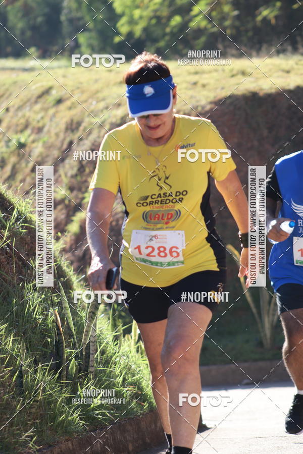 Buy your photos of the eventMeia Maratona de Divin�polis on Fotop