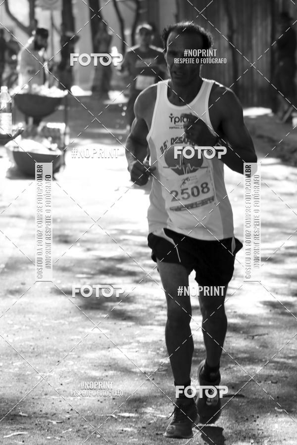 Buy your photos of the eventMeia Maratona de Divin�polis on Fotop