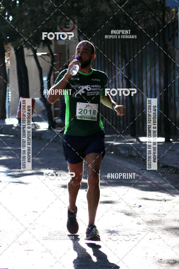 Buy your photos of the eventMeia Maratona de Divin�polis on Fotop