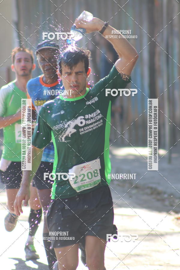 Buy your photos of the eventMeia Maratona de Divin�polis on Fotop