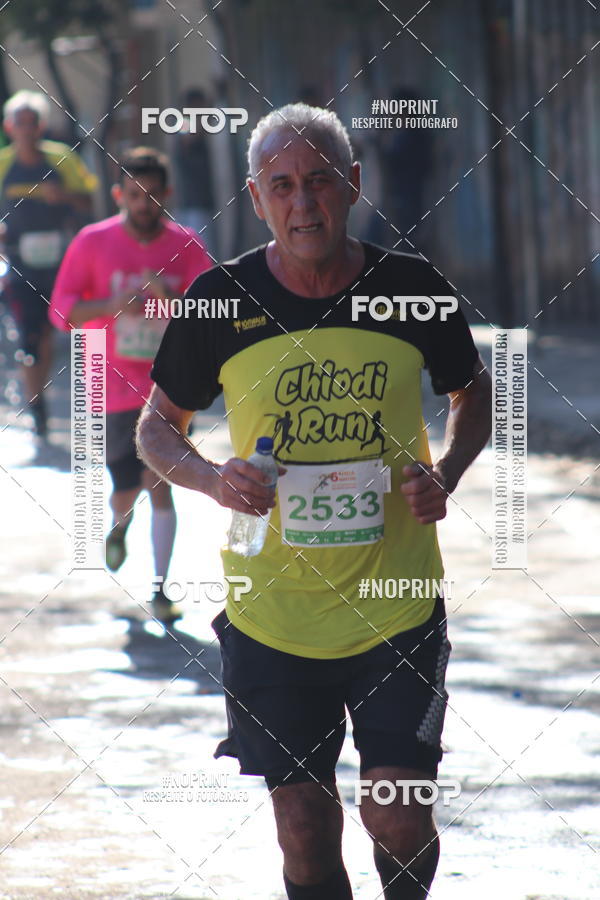 Buy your photos of the eventMeia Maratona de Divin�polis on Fotop