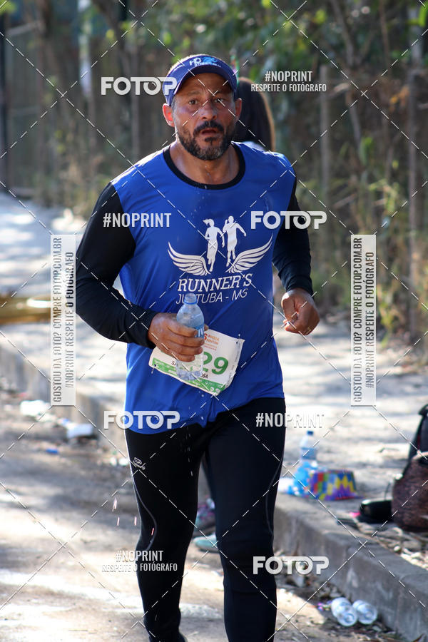 Buy your photos of the eventMeia Maratona de Divin�polis on Fotop