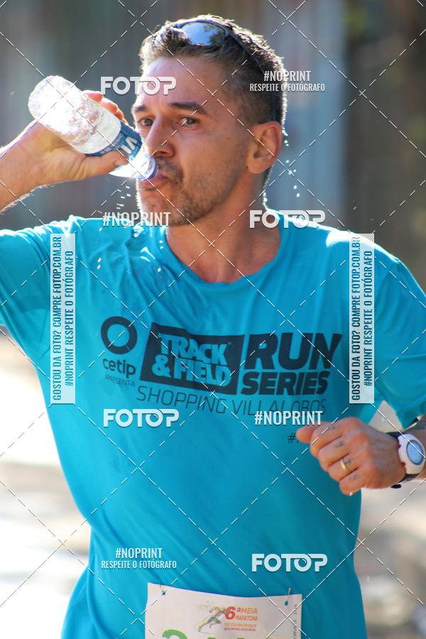 Buy your photos of the eventMeia Maratona de Divin�polis on Fotop
