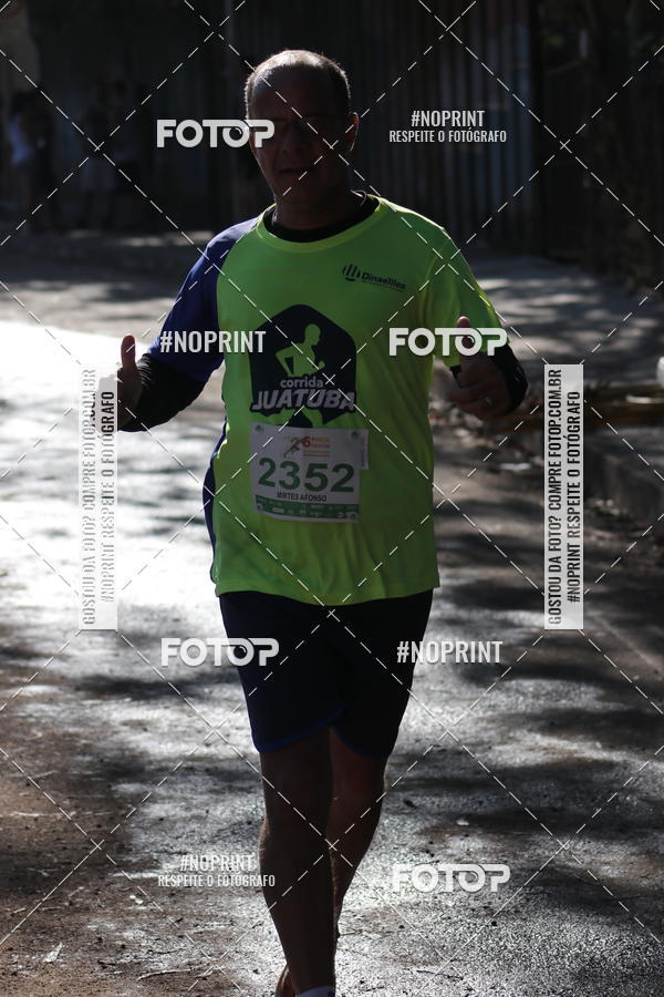 Buy your photos of the eventMeia Maratona de Divin�polis on Fotop