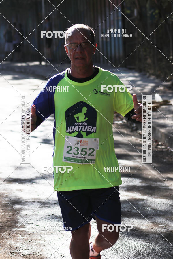 Buy your photos of the eventMeia Maratona de Divin�polis on Fotop