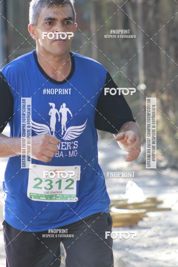 Buy your photos of the eventMeia Maratona de Divin�polis on Fotop