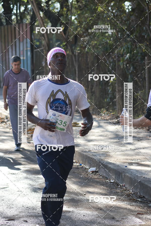 Buy your photos of the eventMeia Maratona de Divin�polis on Fotop