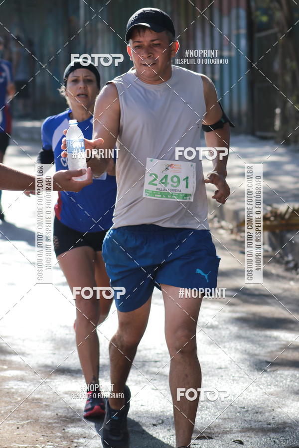 Buy your photos of the eventMeia Maratona de Divin�polis on Fotop