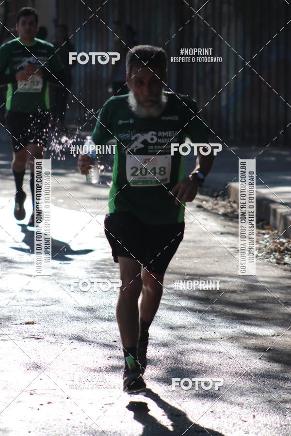 Buy your photos of the eventMeia Maratona de Divin�polis on Fotop