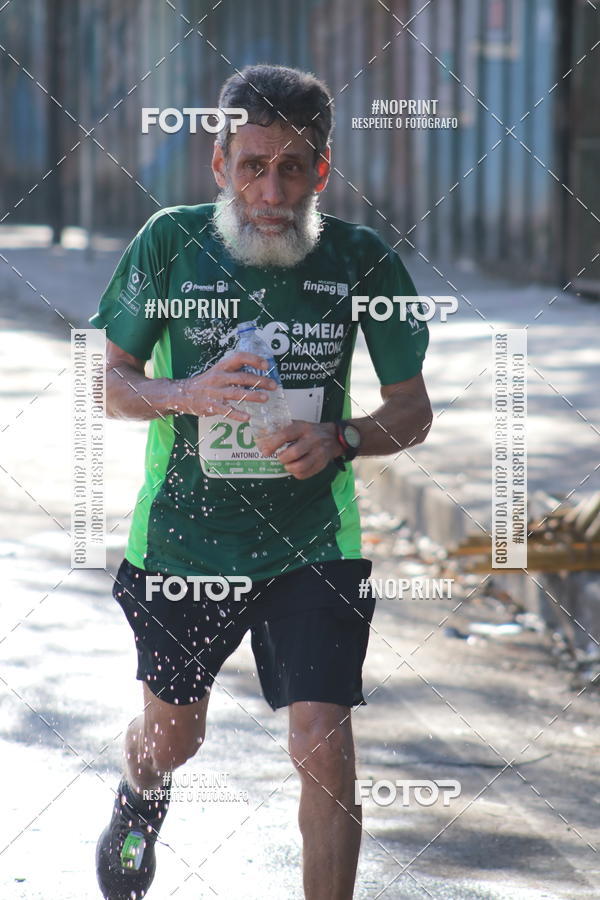 Buy your photos of the eventMeia Maratona de Divin�polis on Fotop