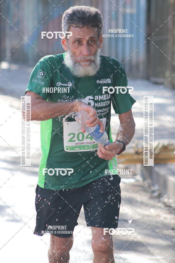 Buy your photos of the eventMeia Maratona de Divin�polis on Fotop