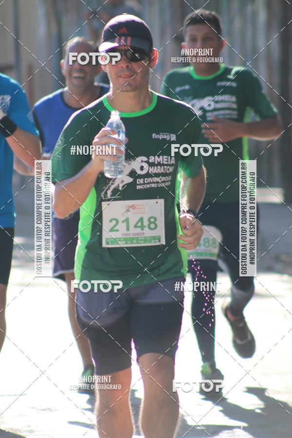 Buy your photos of the eventMeia Maratona de Divin�polis on Fotop