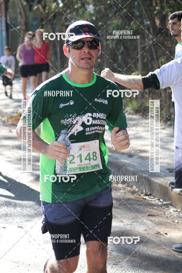 Buy your photos of the eventMeia Maratona de Divin�polis on Fotop