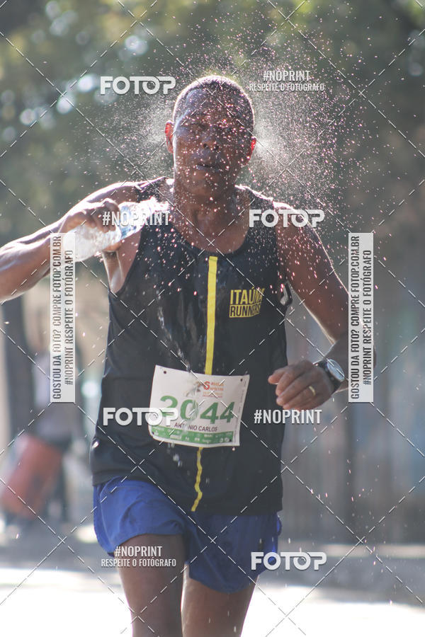 Buy your photos of the eventMeia Maratona de Divin�polis on Fotop