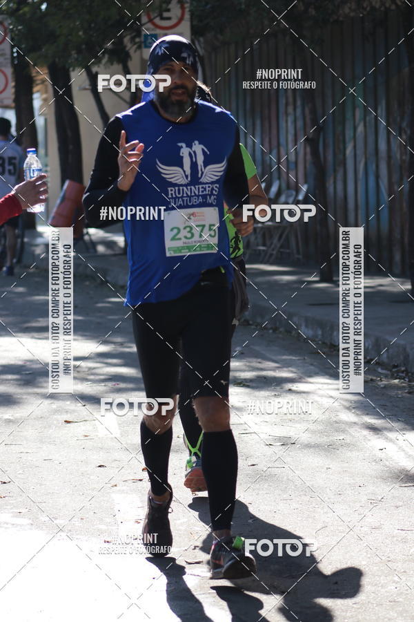 Buy your photos of the eventMeia Maratona de Divin�polis on Fotop