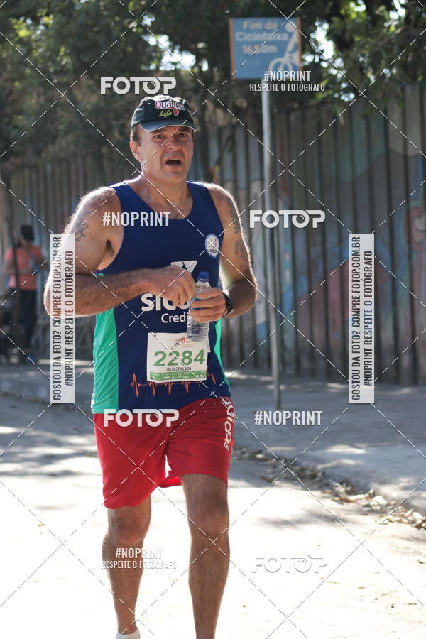 Buy your photos of the eventMeia Maratona de Divin�polis on Fotop