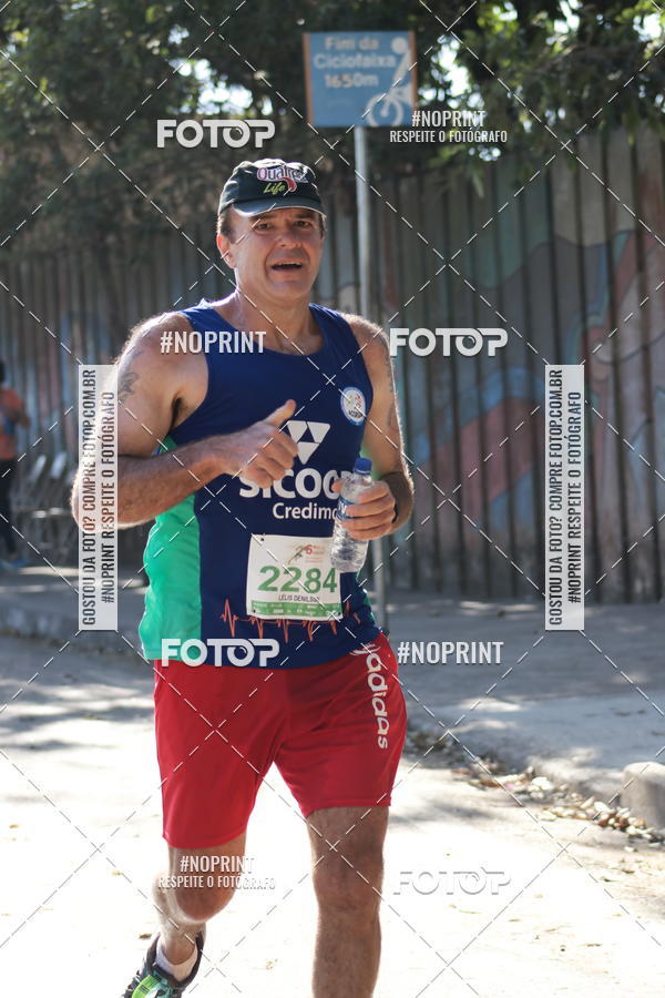 Buy your photos of the eventMeia Maratona de Divin�polis on Fotop