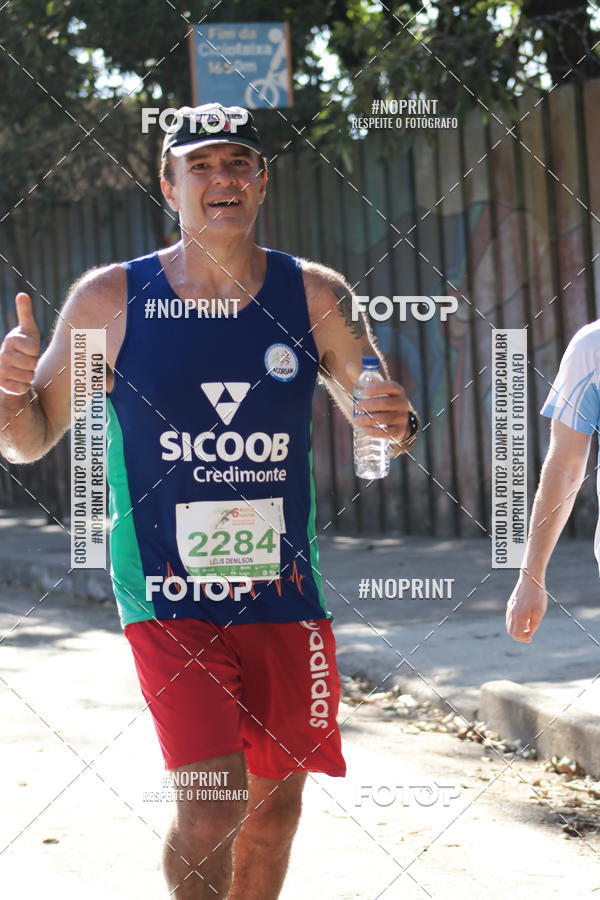 Buy your photos of the eventMeia Maratona de Divin�polis on Fotop