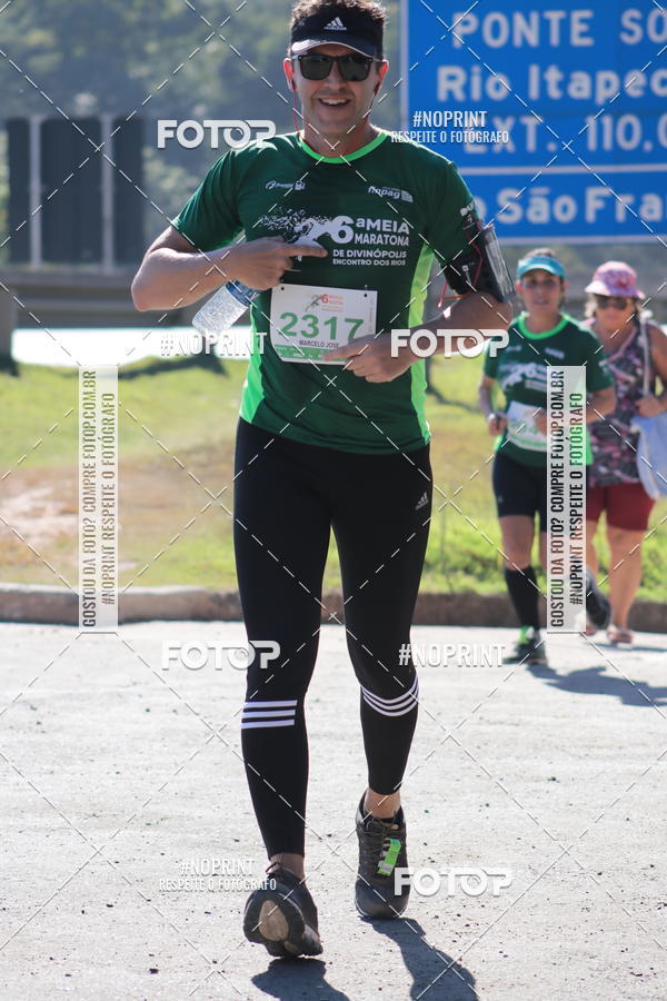 Buy your photos of the eventMeia Maratona de Divin�polis on Fotop