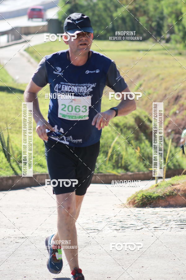 Buy your photos of the eventMeia Maratona de Divin�polis on Fotop