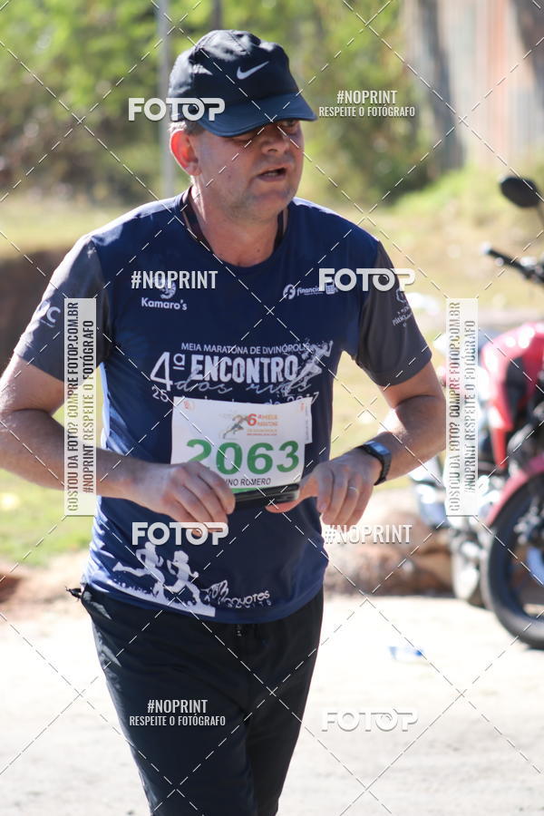 Buy your photos of the eventMeia Maratona de Divin�polis on Fotop