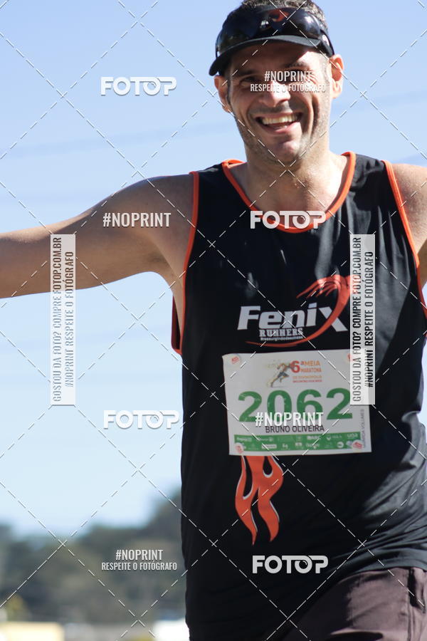 Buy your photos of the eventMeia Maratona de Divin�polis on Fotop