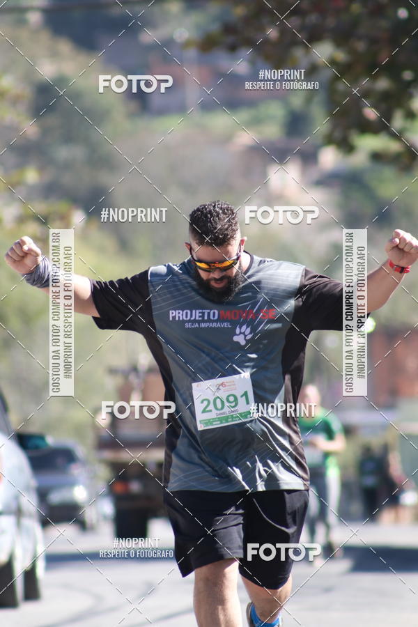 Buy your photos of the eventMeia Maratona de Divin�polis on Fotop