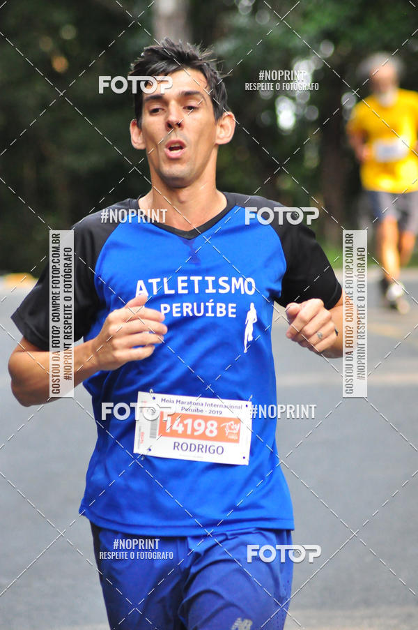 Buy your photos of the eventMeia Maratona Internacional de Peru�be on Fotop