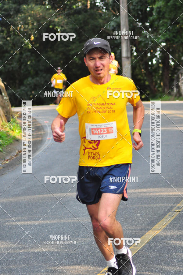 Buy your photos of the eventMeia Maratona Internacional de Peru�be on Fotop