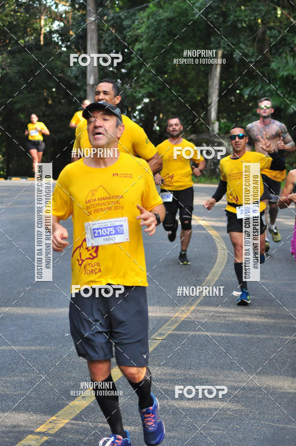 Buy your photos of the eventMeia Maratona Internacional de Peru�be on Fotop