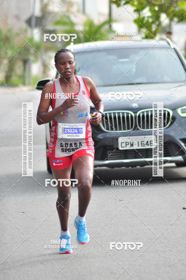 Compre suas fotos do eventoMeia Maratona Internacional de Peru�be no Fotop