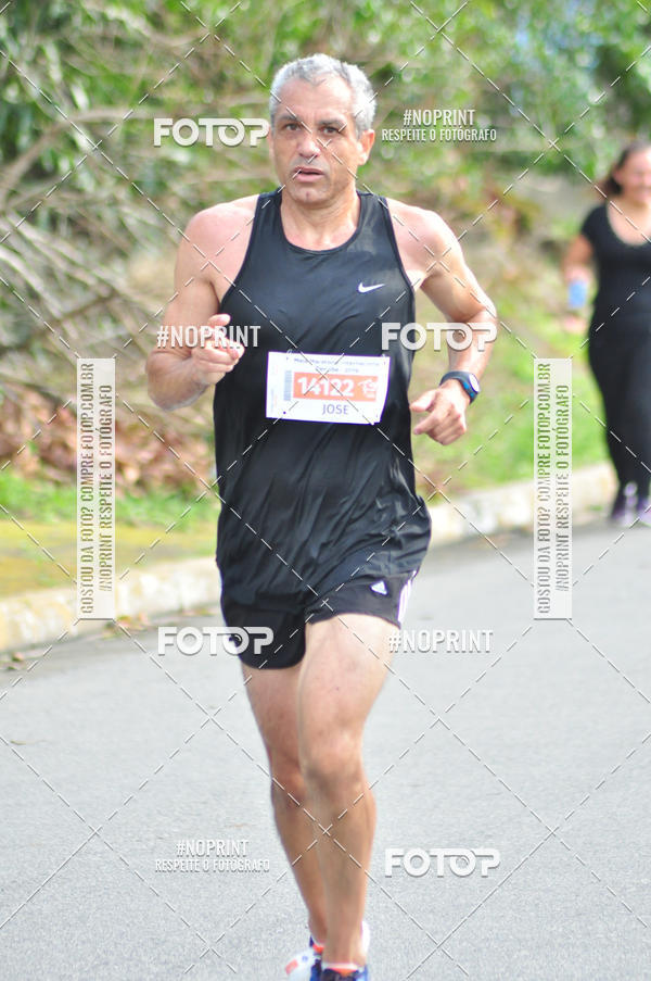 Compre suas fotos do eventoMeia Maratona Internacional de Peru�be no Fotop