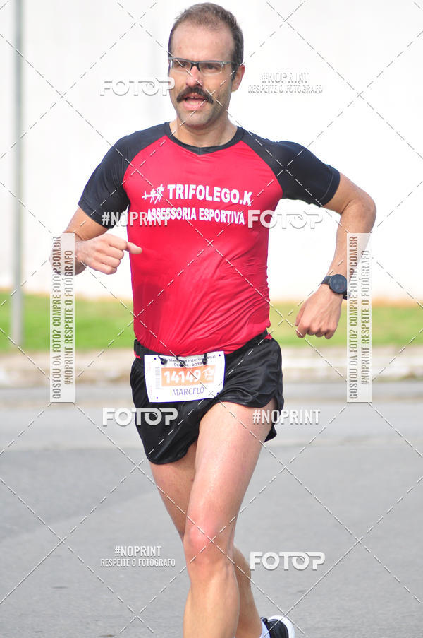 Compre suas fotos do eventoMeia Maratona Internacional de Peru�be no Fotop