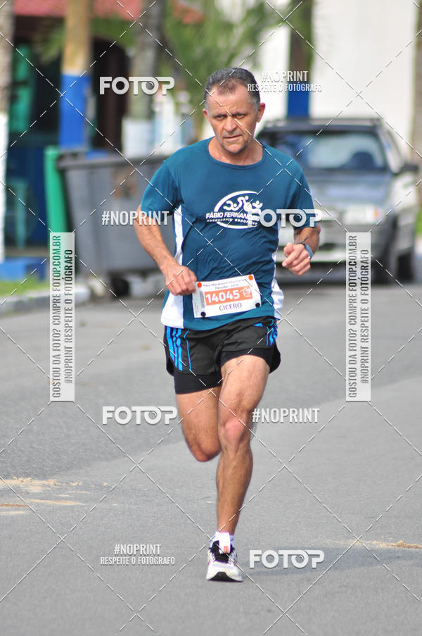 Compre suas fotos do eventoMeia Maratona Internacional de Peru�be no Fotop