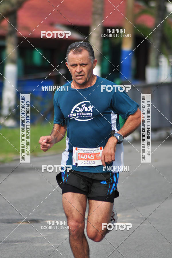 Compre suas fotos do eventoMeia Maratona Internacional de Peru�be no Fotop