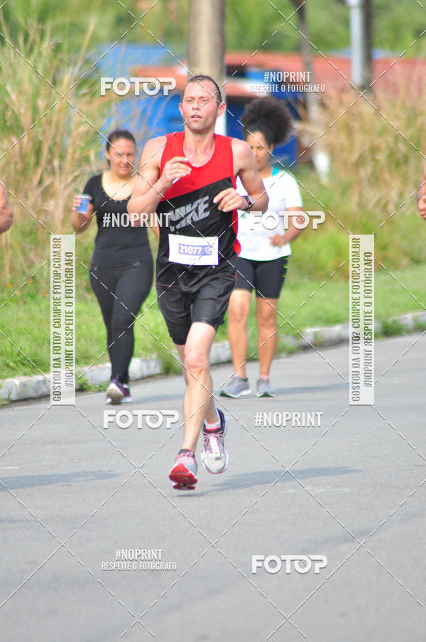 Compre suas fotos do eventoMeia Maratona Internacional de Peru�be no Fotop