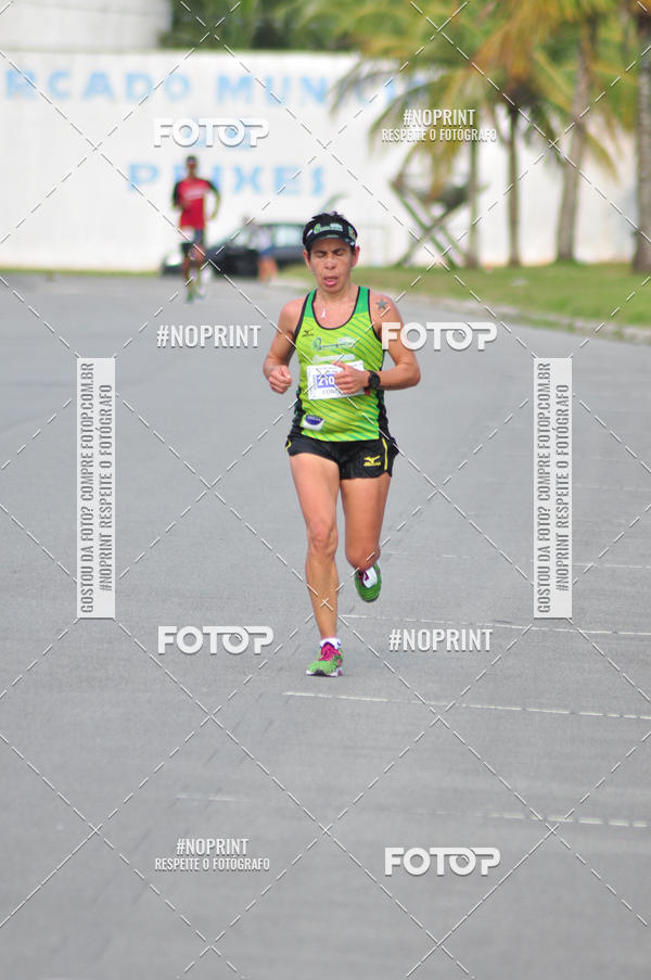 Compre suas fotos do eventoMeia Maratona Internacional de Peru�be no Fotop