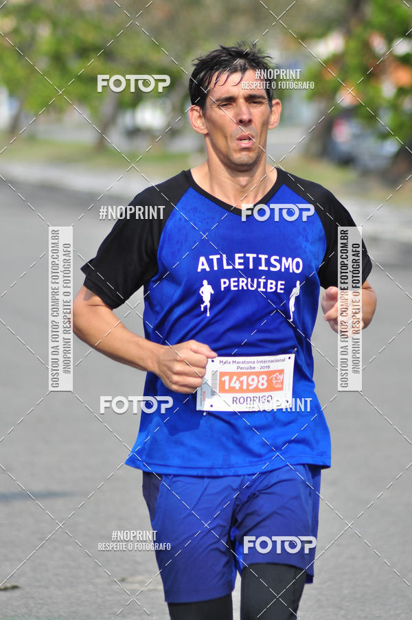 Buy your photos of the eventMeia Maratona Internacional de Peru�be on Fotop